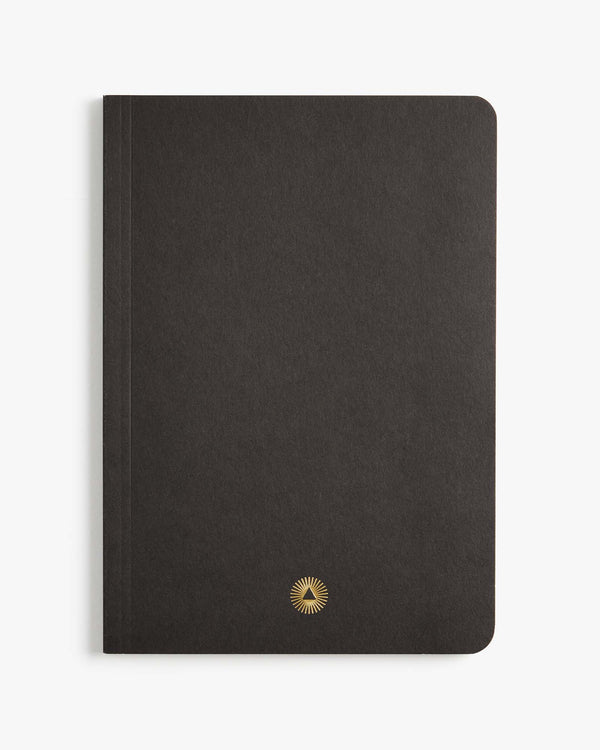 Essential notebook by Intelligent Change created with bespoke paper and made in Germany, Lined long-form journaling notebook with dated pages. Black