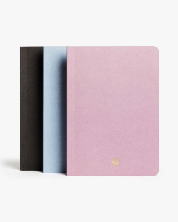 Essential notebook by Intelligent Change created with bespoke paper and made in Germany, Lined long-form journaling notebook with dated pages.
